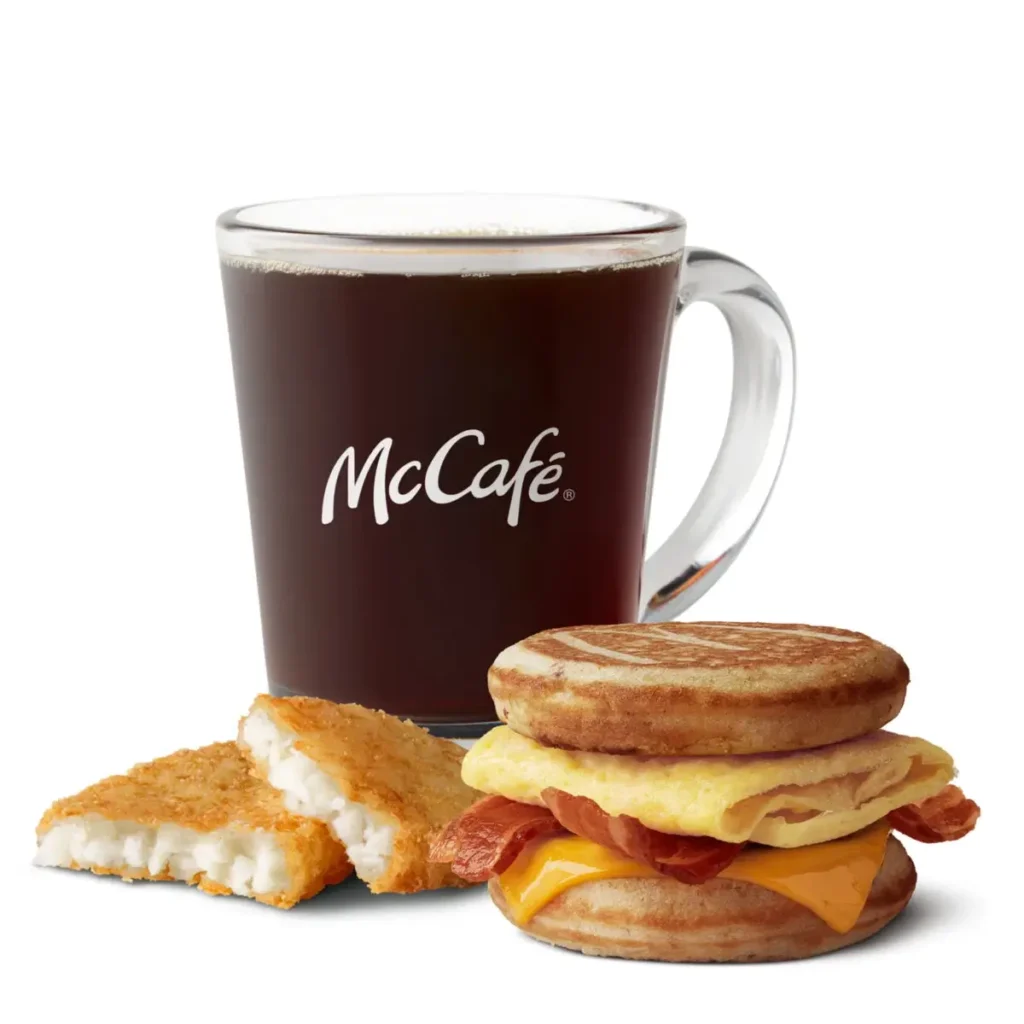 Bacon, Egg & Cheese McGriddles® with hash browns and coffee.