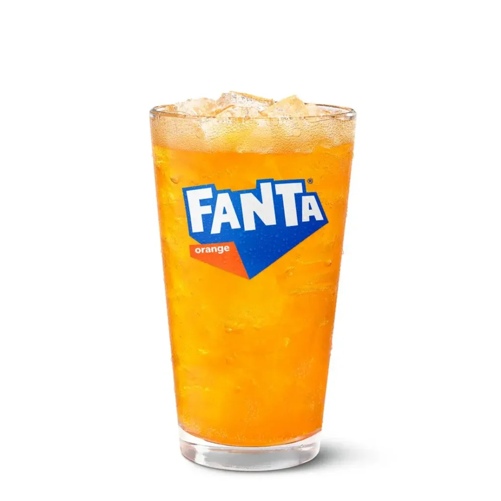 Bright orange Fanta® soda in a cup.