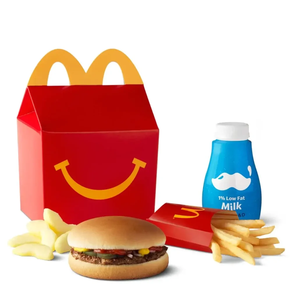 Hamburger with fries and a drink in a Happy Meal® box.