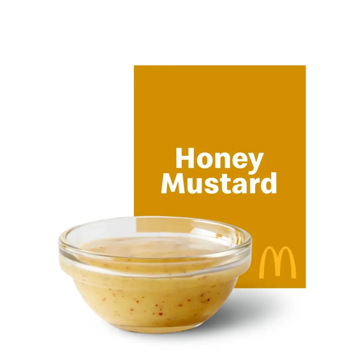 Small cup of McDonald's Honey Mustard Sauce.