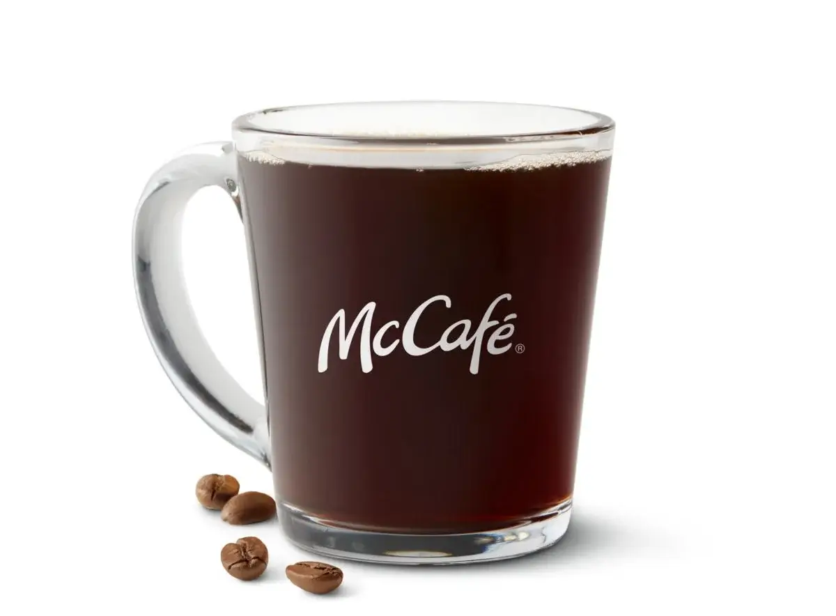 Hot, freshly brewed premium roast coffee in a cup.