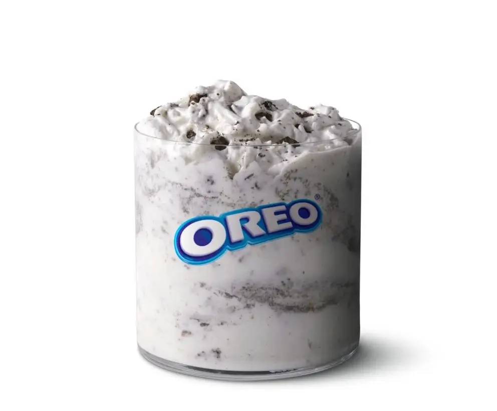 Creamy McFlurry® with OREO® cookie pieces in a cup.