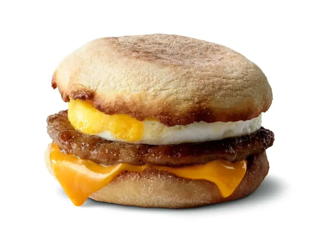 English muffin with sausage patty and melted cheese.