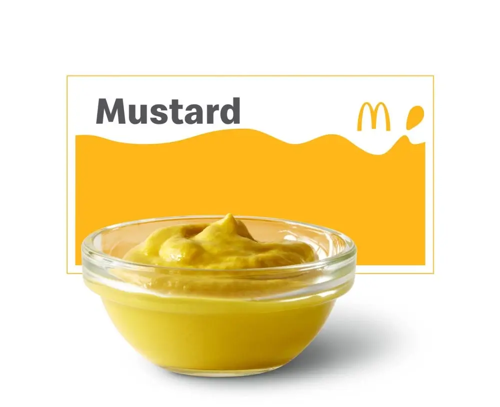 Small packet of McDonald's mustard.