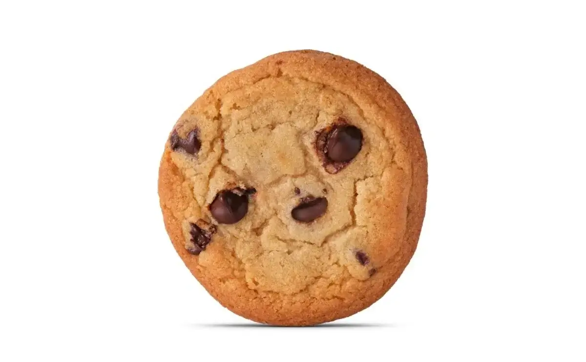 Soft, warm chocolate chip cookie with melted chocolate chips.