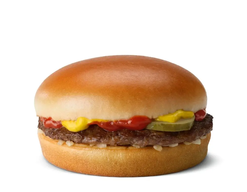 Classic McDonald's hamburger with pickles, onions, and mustard.