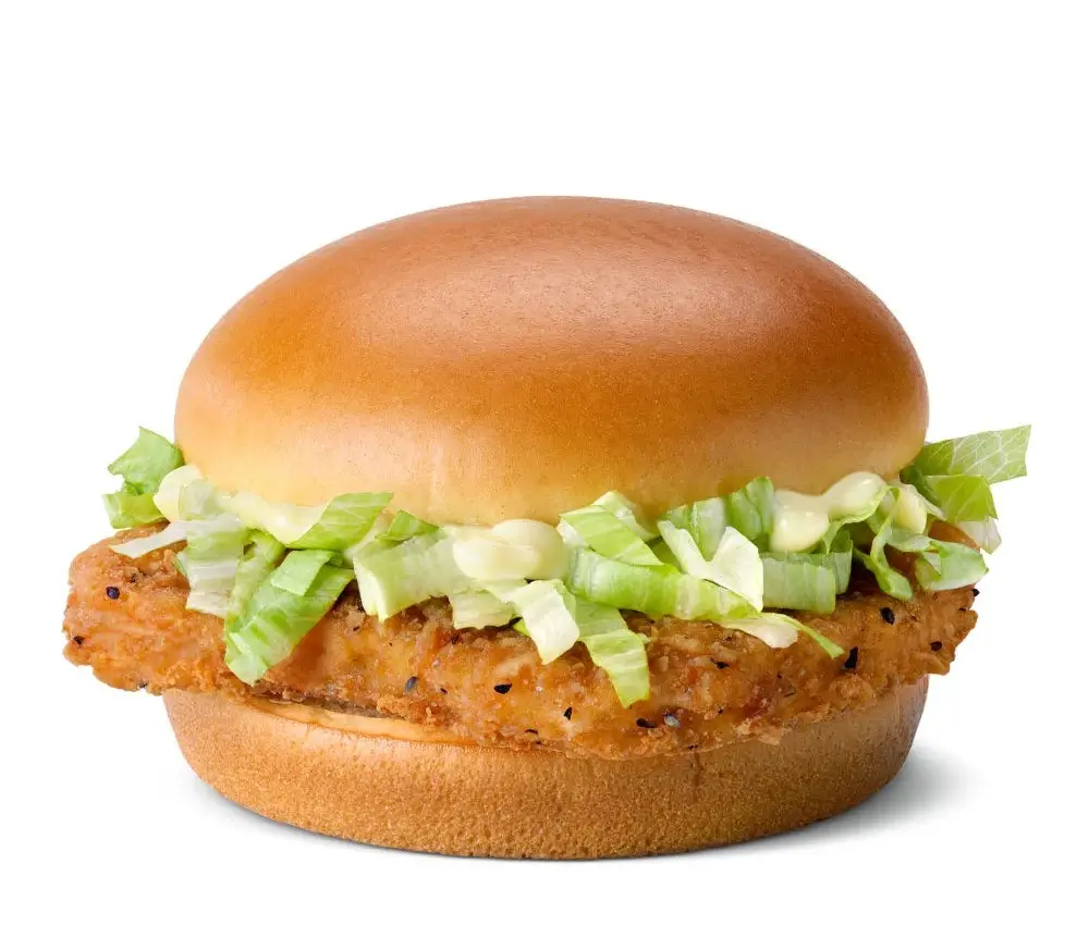 Crispy chicken patty with lettuce and mayo on a toasted bun.